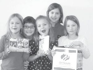 Come and get ‘em! Last year Daisy Scout (L-R) Abbey Stoddard, Hattie Kunze, Shelby Sjogren, Hazel Kemp, and Malin Anderson took orders for Girl Scout cookies. This year, Cook County Girl Scouts are selling cookies through “direct sales” which means you don’t have to wait for your delicious cookies.