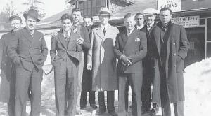 This photo shows some of the Civilian Conservation Corps (CCC) workers assigned to Camp 722 in Hovland taking a break to play some basketball against a Ft. William, Canada team. The photo is from the collection of Joe Spitznagle, the educational advisor assigned to the camp. It is annotated “The gang at Pigeon River – March 1937.”