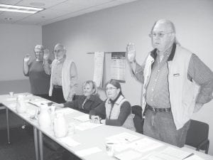 Three of the five members of the North Shore Hospital Board took the oath of office on January 20, 2011 after being re-elected in November. (L-R) Sharon Bloomquist, Howard Abrahamson, Ann Rosenquist, Kay Olson, and Tom Spence.