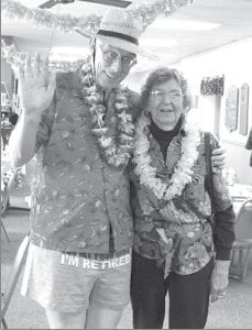 There is almost always something fun happening at the Grand Marais Senior Center. And often, it is something light-hearted and fun, like this celebration on Thursday, January 20. Senior Center visitors were invited to a Hawaiian Luau Luncheon. Left: Bill and Susan Shaeffer pooh-poohed the snow and came dressed in their favorite tropical attire. Above: Buddy Skinner also got in the luau spirit, donning a grass skirt.