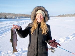 Left: Gabriela Gricol with a beautiful rainbow caught on Birch Lake.