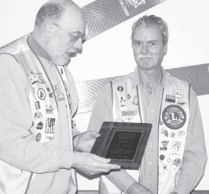 The Grand Marais Lions Club paused to honor one of its members at the February 8 meeting. Ken Wielinski (Left) presented Max Bichel with a plaque honoring Bichel as the Lions District 5m-10’s “Outstanding Club President Award” for 2009-2010. The award covers 55 Lions clubs located throughout Northeastern Minnesota and Northwestern Ontario and Manitoba.