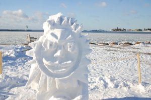 The Winter Tracks Festival in Cook County kicked off last week with a variety of events, including snow sculpting at Harbor Park in downtown Grand Marais. This cheerful sun carving was created by Tom McCann. Look for other snow sculptures throughout the county.