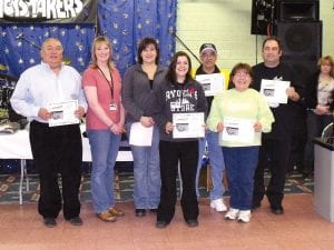 The hard-working Snowarama planning committee was recognized by Easter Seals. (L-R) Todd LeGarde, Billi Carlson, Dana Logan, Debra Owens, Tony Swader, MaryAnn Gagnon, Frank Vecchio. (Not pictured Deb Corcoran)