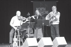 Critter du Jour is Tom Van Cleve, Barb LaVigne, and Ken McMillan. They entertained showcase attendees with their lovely and lighthearted tunes.