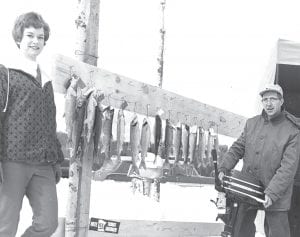 Julie Carlson of Joynes Department Store in Grand Marais shared this photo of a 1959 Lions' Club Trout Derby. It is unknown where the trout derby is being held, but the folks looking at the fish and the outboard motor prize are Carol Schmidt and Walt Mianowski.