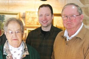 Eleanor Waha was recently honored for her long service to the Cook County Historical Society. Gene Erickson,president of the society, hands Waha a certificate as Eric Humphrey looks on. Erickson said Waha has been instrumentalin all of the success and growth of the organization, and her service goes back half a century. Eleanor currentlyserves as the group’s treasurer. As for her dedication and work, all Eleanor would say is, “I have been happyto serve. I don’t know why anybody is making a big deal out of this, though.”