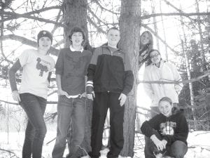 The Knowledge Bowl team members who competed at Mountain Iron on February 16 enjoy some fresh air after the tough competition inside. (L-R) Mara MacDonell, Sean MacDonell, Lars Scannell, Katrina Axtell, Sarah Larsen and Libby Zafft.