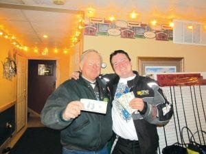 Along the way riders collected playing cards. The winning hands went to Butch Schulte (left) who won $100 with his low hand and Butchie Smith who received $400 for his high hand.