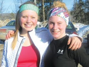 On the slopes or on the trails, Cook County can be proud of its skiers! Molly Rider (left) just finished her Alpine State Meet races when Shelby Ahrendt arrived at Giants Ridge to prepare for her State Nordic Meet the next day. See more Vikings sports on B1 and B3.