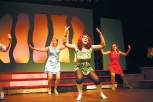 the Is the Arrowhead Center for Arts a happening place? You bet your bippy! Above: Singing and dancing to a swinging ‘60s song are (L- R) Karen Blackburn, Hilja Iverson, Karina Roth. Lower left: (L- R) Molly Hicken, Karina Roth, Kerri Bilben, Karen Blackburn, Hilja Iverson slow it down a little. You are invited to come enjoy the music, fashion, and freedom of the ‘60s courtesy of the Grand Marais Playhouse as it presents Shout! The Mod Musical on March 4 - 5 at 7 p. m. and Sunday, March 6 at 2 p. m. Tickets are $15 at the door or on- line at www.grandmaraisplayhouse.com. Shout! is recommended for ages 12 and older.