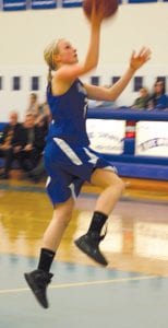 Left: Ailee Larson is in constant motion on the basketball court. Her speed allows her to break down defenses and penetrate the lane for easy lay-ups. Above: Ashley Deschampe has scored more than 1,000 points for her career, and one of the ways she has accomplished this is by making her free throws. Ashley shoots better than 80 percent from the foul line, and usually leads the conference in this category.