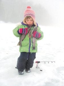 Little Aurora Gallagher, 2 ½, enjoyed a fishing trip to Trout Lake with her grandpa Don Dillenbeck on Thursday, Feb. 17. It was rainy and foggy, but Aurora didn't mind. She is the daughter of Ian Gallagher and Jackie Dillenbeck.