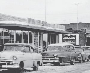 Joynes Department Store and Ben Franklin, which is celebrating its 70th year in business, is shown here as it looked in 1956. The “new” store is in the forefront and the “old” store building, which is no longer standing, is pictured in the background. At right is a News-Herald ad from the store's first year of operation.