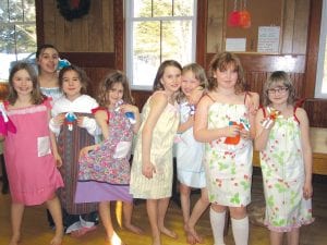 Also making dresses to send to children in Africa was Cook County Girl Scout Troop 4141 with the help of leader Malin Aseby-Gesch, Sharon Bloomquist, and other parent and grandparent volunteers. Showing off the pillowcase dresses and pocket dolls they made on Thursday, Feb. 24 are (L-R) Bianca Zimmer, Madison Foster, Shaelynn Novitsky, Lucy Shaw, Aurora Schelmeske, Emma Gesch, Chloe Blackburn, Jaymie Kirk. See more Girl Scout activities next week!