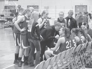 Head Coach T.J. Super diagrams a play for his team in its Section 7A semifinal game played against Mountain Iron-Buhl on March 9 in Hibbing. The Vikings lost a close game to MIB, ending their season with 20 wins and 4 losses. MIB went on to defeat Floodwood for the Section 7A championship and earned a berth to the State Championship tournament. Congratulations to the Vikings on a great season!