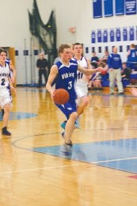 Left: The Vikings will miss senior guard Ryan Martinson (3) next year. Not only is Ryan a talented player, but he’s also a great kid with a big heart for his teammates and the kids in school. Above: Junior forward Dylan Quaife (10) had a great season in all phases of the game. He could be counted on for his tough inside play, solid defense, great rebounding and scoring. He returns next season with sophomore guards Kale Boomer and Colin Everson and junior guard David Bergstrom. This nucleus bodes well for the Vikings next season. Go Vikings!