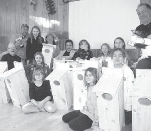 In the afternoon, everyone met at the Colvill Town Hall and using donated lumber, each of the girls built a wood duck nesting box. Malin Aseby-Gesch, Jason Gesch, Grampa Rick Novitsky and Colton Thompson mentored the girls. Aseby-Gesch said the scouts were “eternally grateful” to Sawtooth Lumber for donating wood for the project. (L-R, front) Arvis Thompson, Bianca Zimmer, Jaymie Kirk, Lucy Shaw, Shaelynn Novitsky, Grampa Rick Novitsky. (L-R, back) Jason Gesch, Linnea Gesch, Malin Aseby- Gesch, Madison Foster, Chloe Blackburn, Emma Gesch, Aurora Schelmeske. (Not pictured Sharon Bloomquist and Colton Thompson).