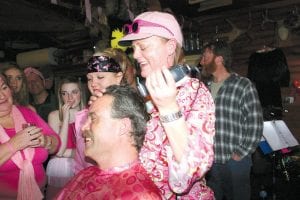 Almost-retired Mark Black agreed to shave his head if over $10,000 was raised for the National Breast Cancer Foundation. It did—and he did! Wife Mary Black seemed all to happy to help.