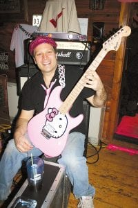 Even the band got in on the pink on Saturday night. Korrey Merritt of D’Merrit showed off his pretty pink “Hello Kitty” guitar.