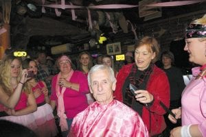 Although WTIP’s Bob Carter did not have to shave his head—he didn’t receive the most donations, so he could have ducked out the door, he went with the flow and let his sweetheart, Helen, take the first cut. “Are you sure?” she asked.