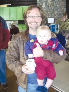 Left: Jim and baby James Miller of Hovland were two very happy campers at the chili cook-off.