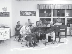 The North Shore Care Center is a musical place! The North Shore Community Band performed Dixieland and swing music on Fat Tuesday for the annual Mardi Gras dance at the Care Center.