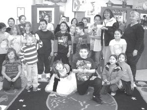 Left: The Grand Portage Elder Advisory Board recently made a donation of $200 to Oshki Ogimaag for new books and reading materials for the library. The “Reading with Kids” program has been fun for all, with new friendships forming along with reading skills. Above: The Elders held their annual St. Patrick’s Day Stew Cook Off, Meat Bingo, and 50/50 raffle fundraiser on March 17th at the Grand Portage Lodge & Casino bingo hall. Thirteen stews were entered. After a lot of taste testing and deliberation, it was deemed that all were delicious, however, Missy Ranta won first prize. She received a package of stew meat, $20 and bragging rights for a year!