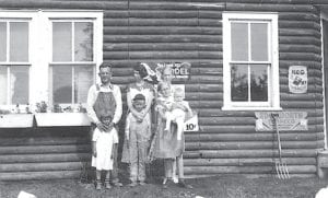 Another photo (circa 1936) from the collection of Elsie Mosher-McKay, which shows not only the store at Mineral Center, but the family who ran the store and nearby garage. (L-R, front) Betty, Bob, Elsie, holding little brother, Don. (L-R, back) Leno Mosher, his wife, Margaret, and daughter, Helene. The homes and stores of Mineral Center are all gone now, but the road that led to them remains in Grand Portage, the Mineral Center Road.