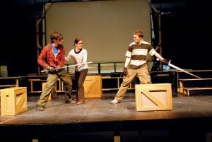 Actors Will Brandenburg (Macbeth)(L) and Jeff Fenwick (Macduff)(R) work with instructor Annie Enneking(C) on their stage fight choreography and technique for the upcoming Playhouse production of Macbeth which runs April 28-May 1 and May 5-7 at the Arrowhead Center for the Arts.