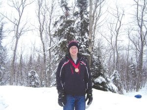 Anders Zimmer, 15, of Grand Marais had another exciting season with Team Duluth and the United States Skiing Association (USA). He is pictured above at Loch Lomond, Ontario with his third place medal in the slalom event. Anders was the top United States finisher in the International Ski Federation (FIS) race.