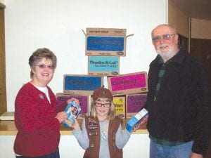 Abbey Stoddard, Brownie Girl Scout from Troop #401,1recently helped deliver over 80 boxes of Girl Scout cookies to the Cook County Food Shelf, thanks to several organizations that purchased cookies from Abbey for the Food Shelf. Abbey and her parents, Diane and Jeff Stoddard, expressed appreciation to Lutsen Resort, East Bay Suites, Caribou Highlands Lodge, and Grand Marais Hotels - Aspen Lodge. Thanks to them there will be an “extra Brownie smile” in Food Shelf packages.