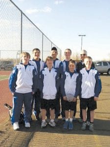 Cook County High School boys’ varsity tennis team after its historic first win over Hermantown on April 11, 2011. (L-R, front) Jamie Wick, Collin Berglund, Daniel Ahrendt, Lars Scannell. (L-R, back) Justin Goldstein, David Bergstrom, Pete Summers, Coach John Muus.