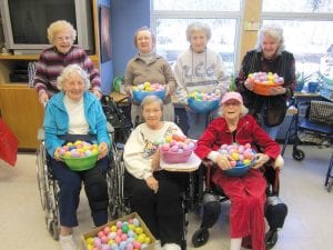 The Easter Bunny had lots of helpers at the North Shore Care Center filling hundreds and hundreds of eggs with candy—just in time for the big Community Easter Egg Hunt on Saturday, April 16. The Egg Hunt is sponsored by the Cook County Kids Plus Program. (L-R, front) Donna Willett, Joyce Kehoe, Ruth Stimmler. (L-R, back) Mable Stoltz, Marigold Linnell, Phyllis Anderson, and Dorothe Vaughn. Care Center Activities Director Kay Rosenthal quipped, “The Care Center is an egg-cellent work site for the Egg Hunt event!”