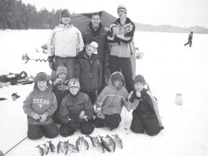 Boy Scouts and Cub Scouts enjoyed a day of ice fishing on Moss Lake on March 12, 2011. (L-R, front) Cub Scouts Noah Furcht, Vaughn Swindlehurst, John VanderHeiden, Silas Sobanja (L-R, middle) Lucas Sheils, Tristan Walton, (L-R, back) Boy Scouts Aaron Breitsprecher, Daniel Ditmanson, and Kyle Martinson.