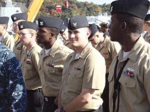 Navy Fire Controlman Evan Smith (far right) is serving aboard the USS Shiloh in Yokosuka, Japan. Smith is a member of Operation Tomodachi, assisting with earthquake recovery.