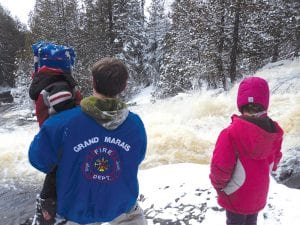 A winter waterfall! The hike to Thompson Falls in Grand Marais is normally an easy stroll. It took a bit longer to get there on Sunday, April 17, as the Bally Creek Road was not plowed. However, it is worth the extra effort to see the water roaring over the falls that in the summer are mellow enough to wade in.