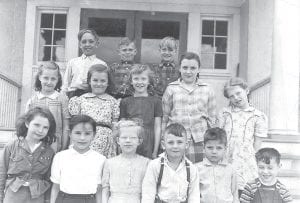 Dee Brazell of World’s Best Donuts shares this fun photo with Cook County News- Herald readers. It was given to her by her aunt, Carolyn Lindskog Engebretson of Rochert, MN. Carolyn is the third little girl in the front row. The photo is of the Maple Hill School students. (L-R, front) Evelyn Pederson, Anabel Johnson, Carolyn Lindskog, Donald Olson, Chester Lindskog, David Cartright. (L-R, middle) Helen Violet Everson, Helen Olson, Margaret Peterson, Joanne Grivell, Margaret Anderson. (L-R, back) Harry Everson, Bill Boissenin, Carl Brandt.