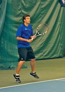 Above: David Bergstrom is undefeated so far this season and plays No. 1 singles for the boys' tennis team. Left: Lars Scannell, just an eighth grader, is the Vikings' No. 2 player and despite playing with a broken pinky finger, won his match against Virginia’s No. 2 player.