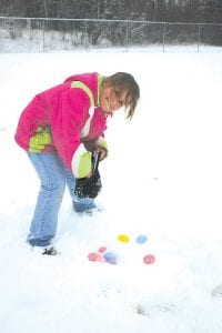 The KidsPlus Easter Egg Fundraiser was a lot of fun, despite the approximately 4 inches of snow that fell the night before. Enterprising Sienna Denewith used a stocking cap to hold the Easter eggs she found in the snow. See more about the KidsPlus fundraising event on page A4.