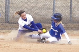 The action was fast and furious in the girls' game against the Silver Bay Mariners last week. Here CeCe Schnobrich guards the plate while trying to tag out the Silver Bay player. The Vikings were ahead until the last inning when the Mariners clawed their way back to win by one run. Both teams played well and fought hard, said Head Coach Jessie Anderson.