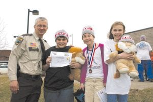 The 2011 DARE (drug and alcohol resistance education) graduation was held Monday, April 25 at the Arrowhead Center for the Arts. There were 39 fifth-graders in this year’s class. Three of them received special recognition. They are pictured here with DARE instructor Deputy Leif Lunde. (L-R) Deputy Lunde, Jackson Fenner, Maya McHugh, Linnea Gesch. Read about the DARE program and graduation on page B5.