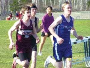 Left: Kieran Scannell scorched the field in the mile by running a lifetime best of 4:33. He won the race by 21 seconds. Scannell came back and took second in the twomile with a fine time of 10:37.