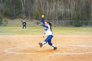 Above: Although the Vikings lost 6-2, Kristina Rude pitched a strong game against Two Harbors. Rude has had a strong season at the plate and continues to improve as a pitcher. Left: Signe Larson uses some of her great legspeed on the base paths against the Two Harbors Agates. Larson got a big hit that drove in two runs and played well in the field.