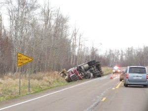 A semi-trailer left the roadway near Highway 61 milepost 70 on Wednesday, May 11. The truck ended up on its side on the upper side of the highway.