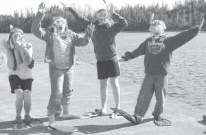 The public is invited to watch a number of young people (and a few adults) take the plunge into Lake Superior from the Chicago Bay dock in Hovland to raise money for Soles 4 Souls. Come out and watch the freezing fun on Wednesday, May 25 at 5:00 p.m. (L-R) Aubry Lewis, MaeAnna LaFavor, Claire Sherburne, Danny Lewis.