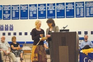 Class of 2011 Valedictorian Ailee Larson accepts the Scott Scholarship from CCHS Principal Gwen Carman. The Scott Scholarship award is $1,050 and is renewable.