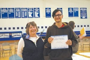 A new scholarship was presented this year by Sue Riley, in honor of her husband, Daniel Patrick Riley. Will Brandenburg was the recipient of the $1,500 award.