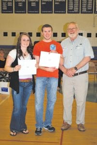 Marland Hansen of Lutsen said he was proud to represent the Masonic Lodge by presenting scholarships of $2,000 each to Kristina Rude and Jesse Johnson.