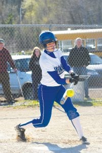 Above: Rachel Wieben put the barrel of her bat squarely on the ball and came through with a single for the Vikings in their match against the Albrook Falcons last week. Eight Vikings got hits in the game and the Vikings played solid defense throughout. The Vikings have now notched four wins this season. Left: After a furious sprint and a hard, dusty slide into home plate Anna Carman was declared safe by the umpire. Carman and the Vikings defeated Albrook 11-2.